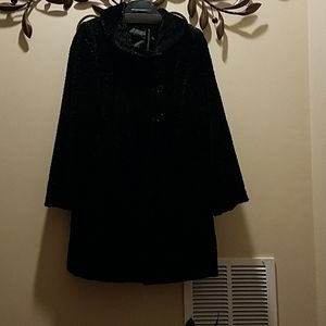 Faux fur knee length coat